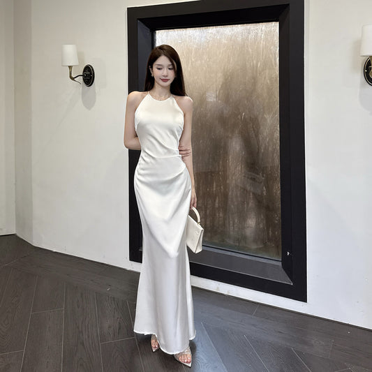 Sleeveless ruffled satin French-style dress with a high-end aesthetic