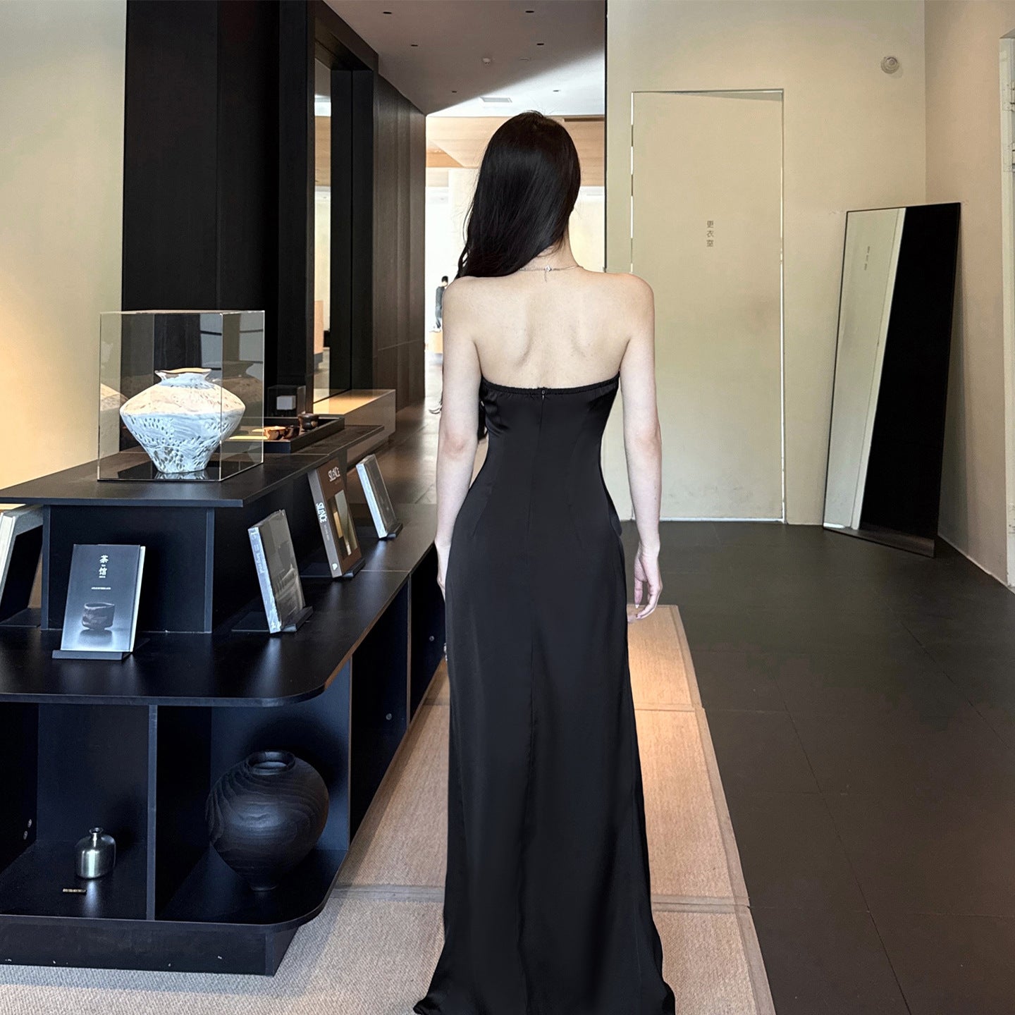 Satin black strapless fishbone design with a hip hugging long skirt