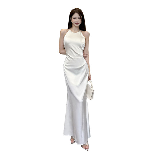 Sleeveless ruffled satin French-style dress with a high-end aesthetic