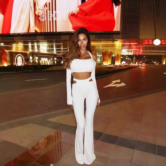 Hanging neck long sleeved top with hollowed out waist and micro flared long pants two-piece set